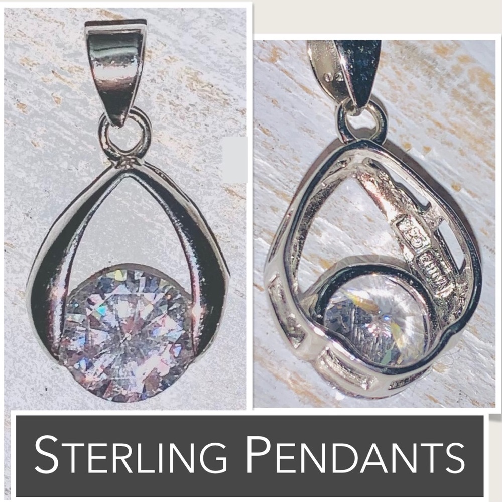 Sterling Silver Pendant: Teardrop silver shape with rhinestone set within
